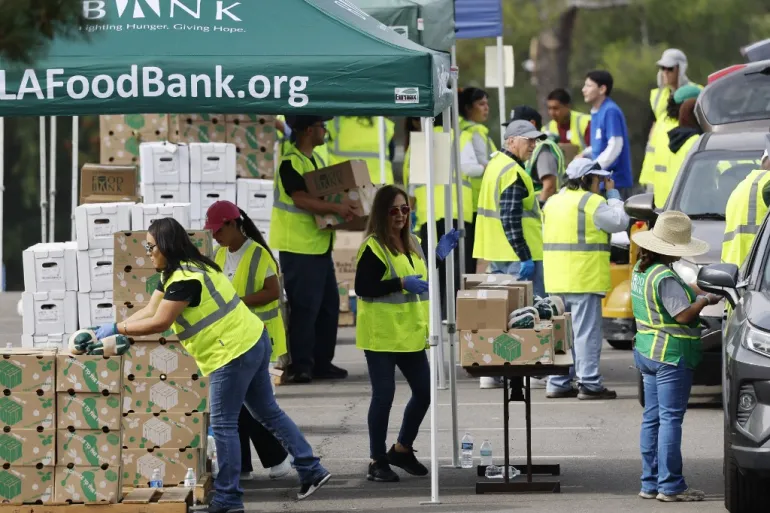 Food bank distribution during the U.S. Supreme Court food-aid pause affecting Americans.