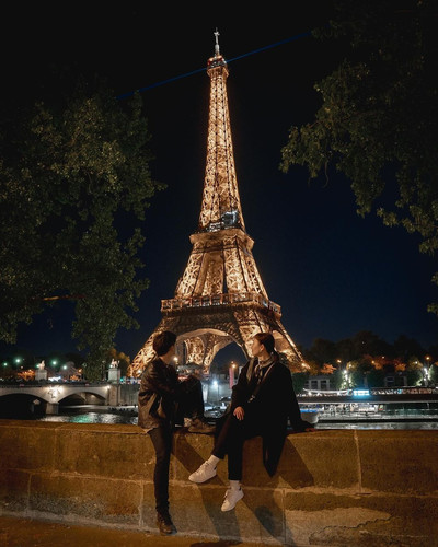 Paris Eiffel Tower night view travel couple Europe tour
