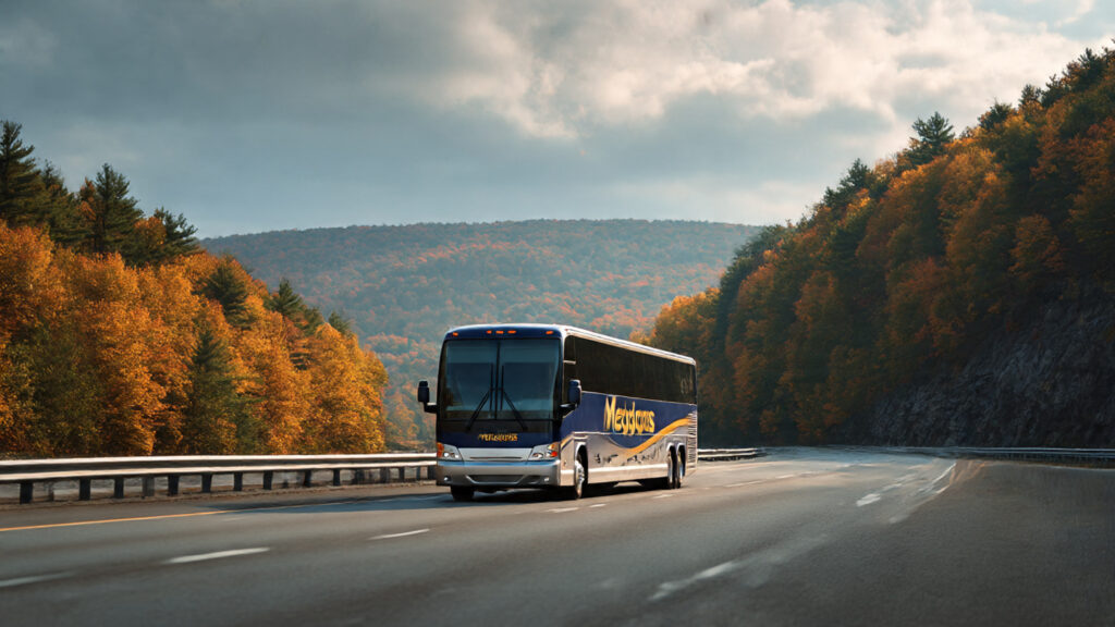 Megabus on US highway during air travel chaos 2025 as passengers switch from flights to buses.